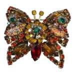 Vintage rhinestone butterfly brooch with cat eye navettes.
