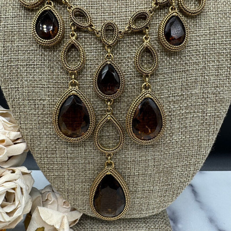 Goldette statement necklace close-up.
