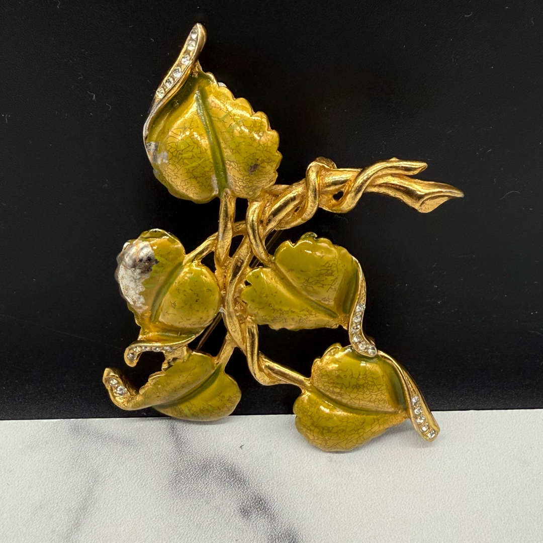DeRosa enameled vine brooch.