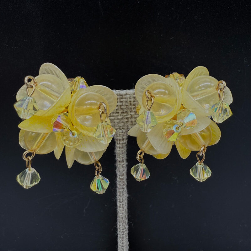 Hobe floral resin clip back earrings.