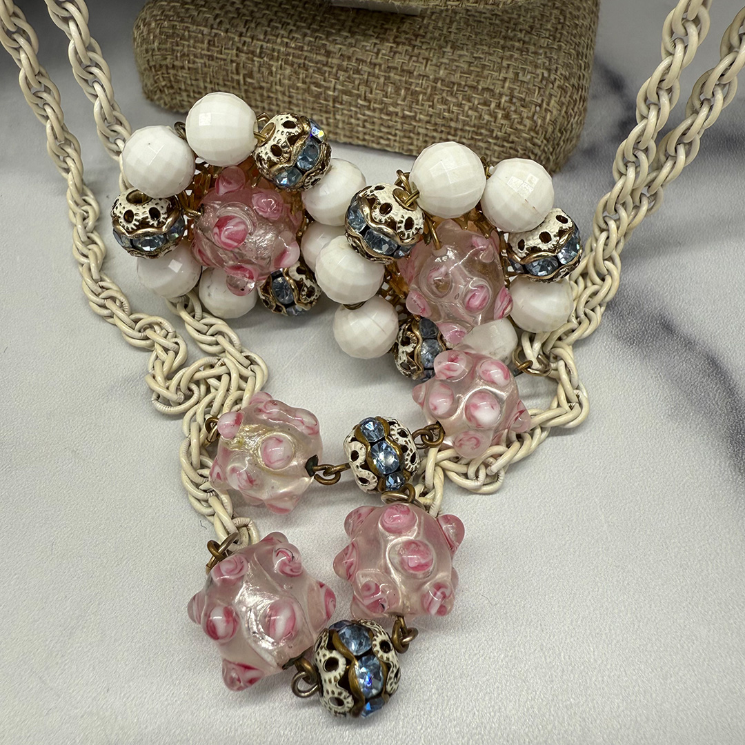 Hobe white enamel station necklace and earring set.