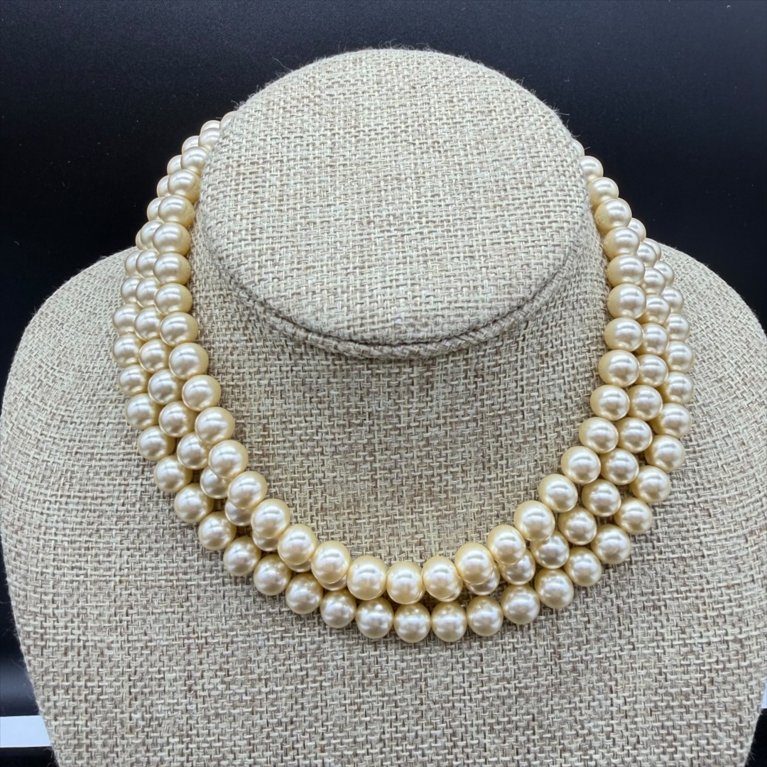 Beautiful vintage triple-strand glass faux pearl necklace.