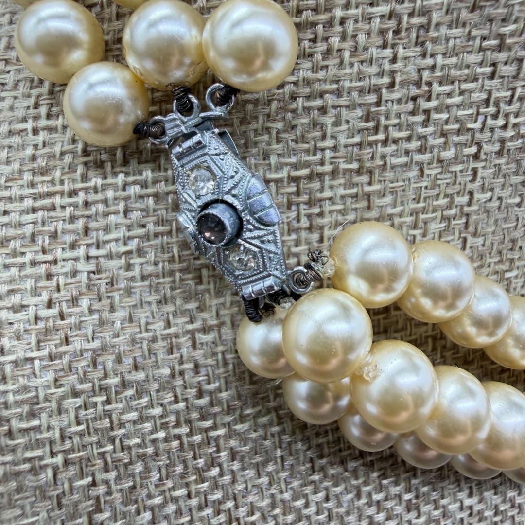 Beautiful vintage triple-strand glass faux pearl necklace.