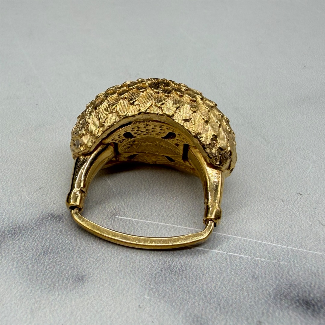 Vendome gold-tone textured ring back.