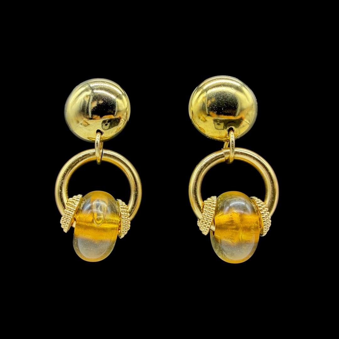 Vintage 1980s Italian amber-colored resin dangle clip earrings.