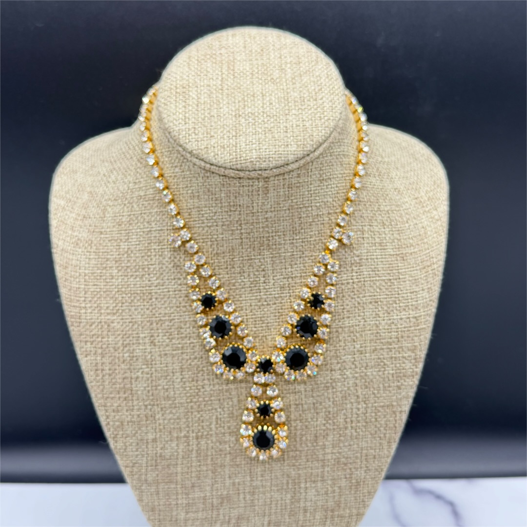 Vintage gold-tone black rhinestone necklace.